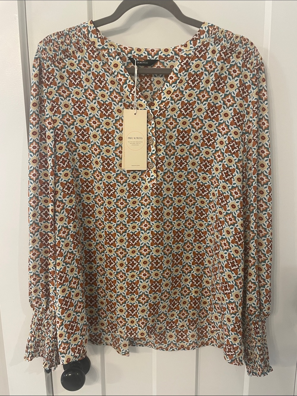 NWT Dokotoo Rust and Teal Geometric Floral Long-Sleeve Blouse
